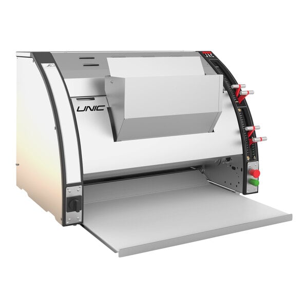 A white and silver JAC UNIC automatic vertical dough moulder with a lid open.