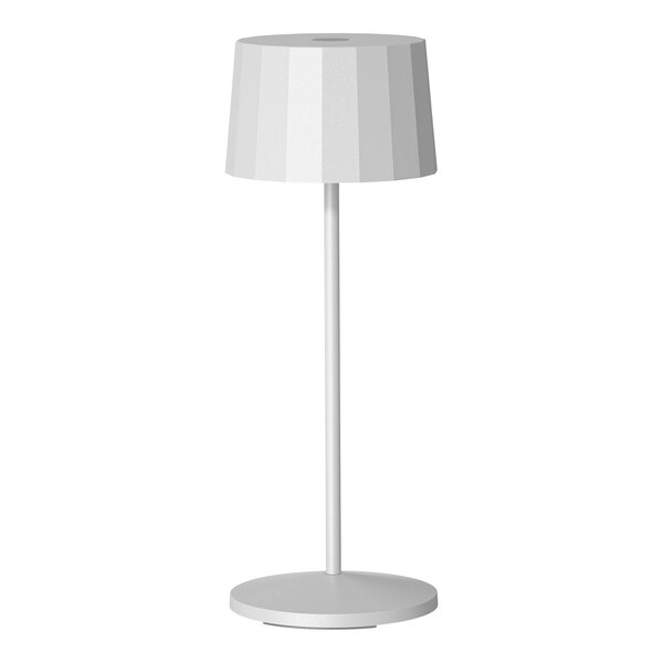 A white Lampa Octa rechargeable table lamp with a white shade on top.