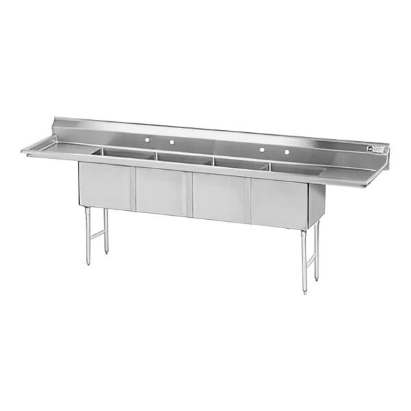 A stainless steel Advance Tabco four compartment sink with two long rectangular drainboards.