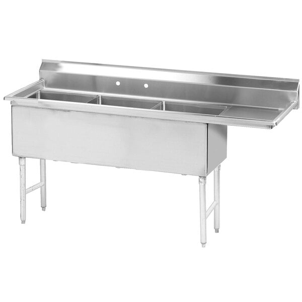 An Advance Tabco stainless steel three compartment sink with a right drainboard.