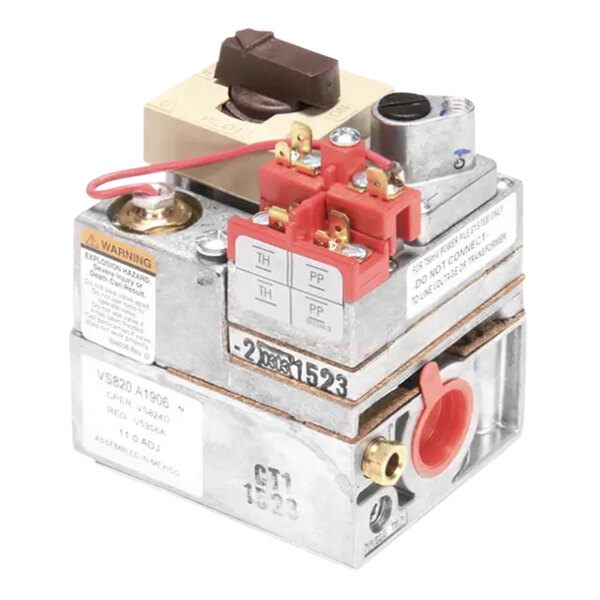 A Frymaster natural gas valve with a red button and a red knob.