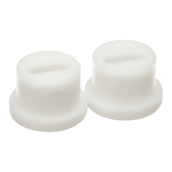 A pair of white plastic Spaceman beater guides.