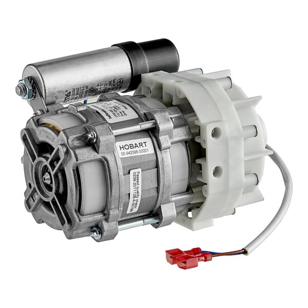 A close-up of a Hobart Rinse Pump / Motor with a wire attached.