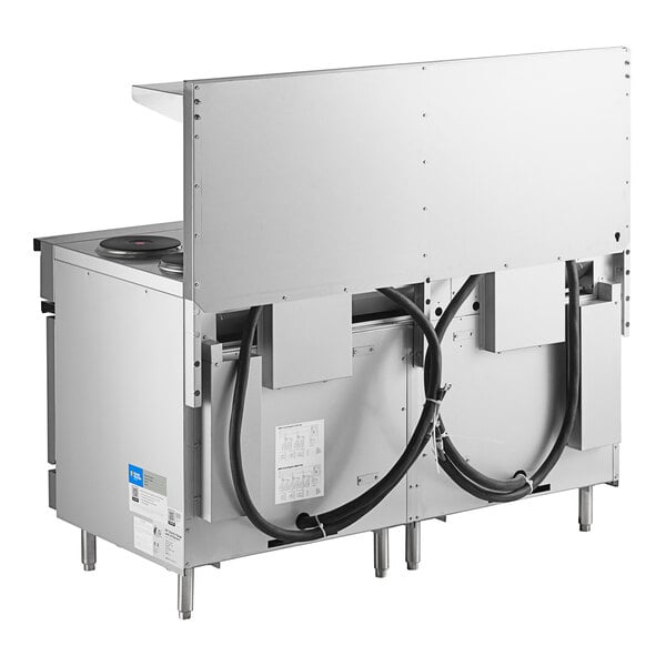 A large stainless steel Cooking Performance Group electric range with two ovens.