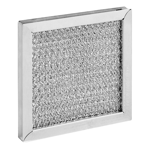 A close-up of a square metal filter with a square mesh.