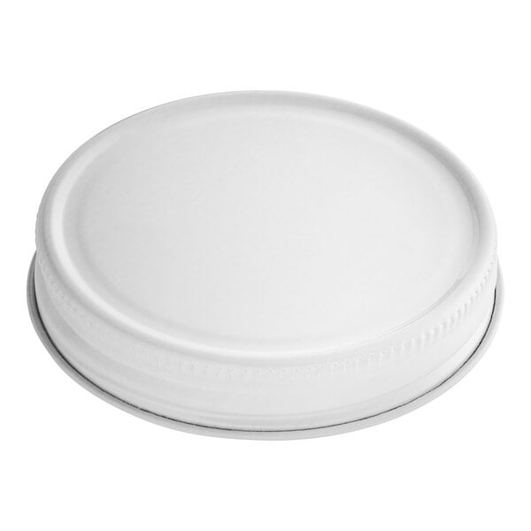 A white metal 58/400 lid with a plastisol liner.