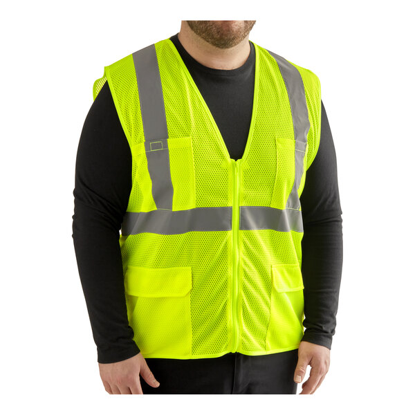A man wearing a small Lavex yellow high visibility safety vest.