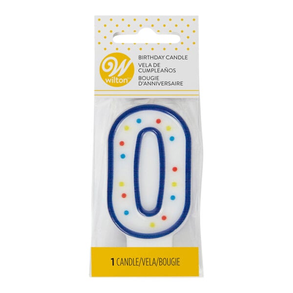 A blue birthday candle with white polka dots in the shape of the number zero.