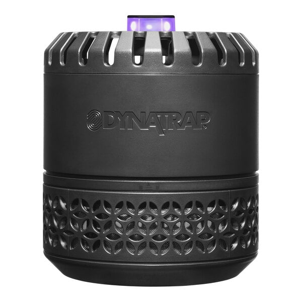 A black round DynaTrap indoor flying insect trap with holes.