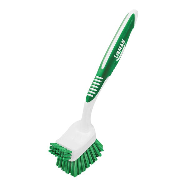 A white and green Libman Big Job kitchen scrub brush with a handle.