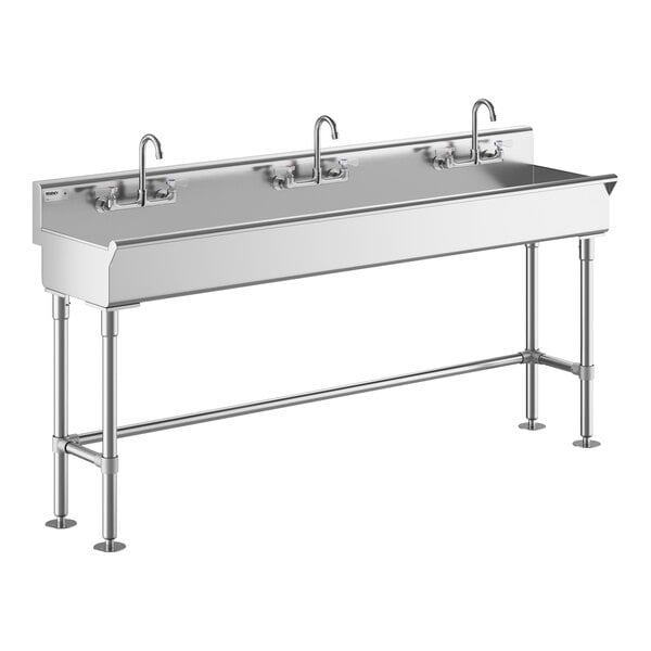 A Regency stainless steel hand sink with (3) faucets.