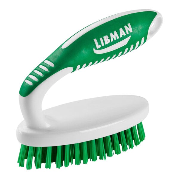 A white and green Libman iron scrub brush.