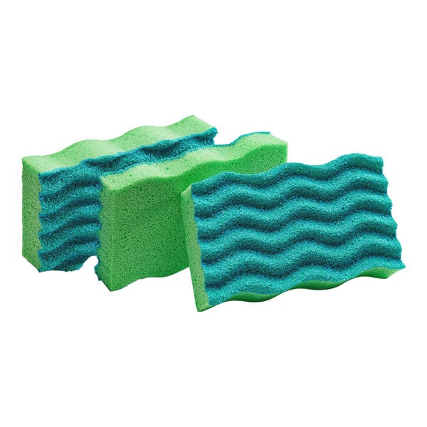 A group of green Libman antibacterial sponges.