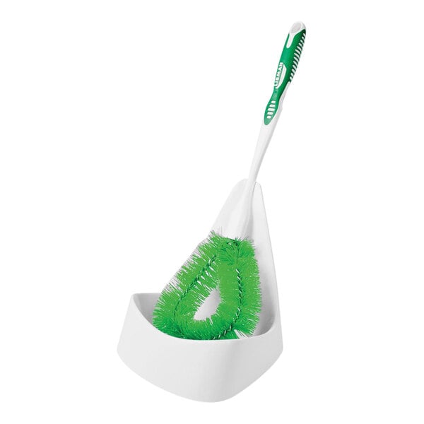 A green Libman toilet bowl brush in a white caddy.