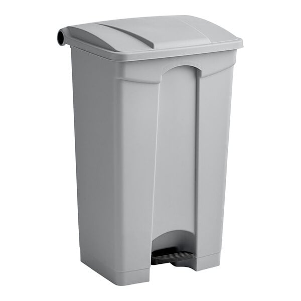 A grey plastic Lavex step-on trash can with a lid.