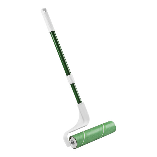 A green Libman lint roller with a white extendable handle.