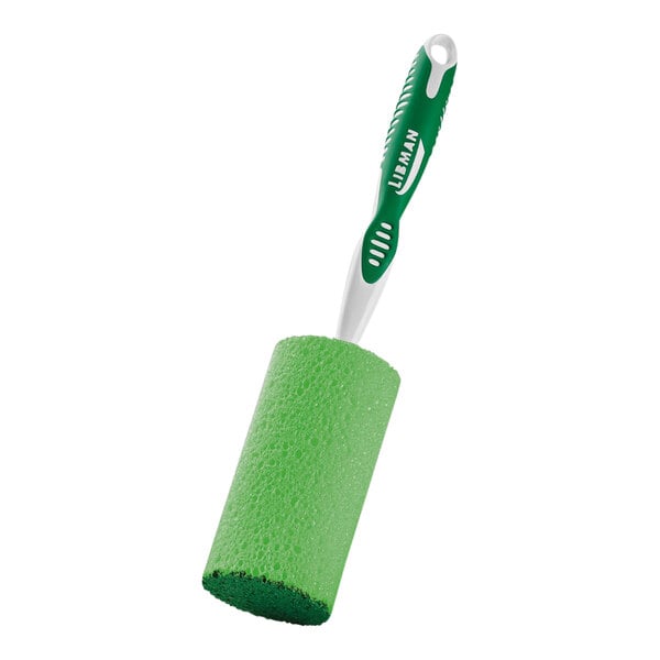 A green Libman cylindrical sponge with a white handle.