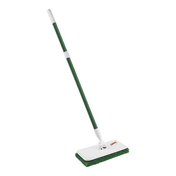 A white rectangular Libman Wall / Floor Scrubber with a white handle.