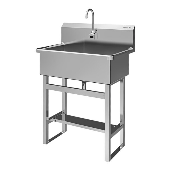 A large stainless steel floor-mounted scrub sink with a battery-powered faucet.