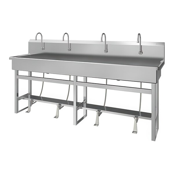 A large stainless steel floor-mounted multi-station Sani-Lav utility sink with (4) foot-operated faucets.