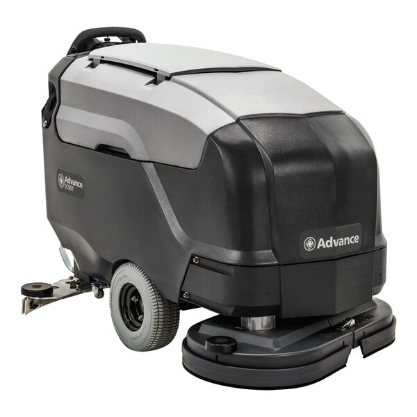 An Advance SC901 cordless walk behind floor scrubber with wheels.