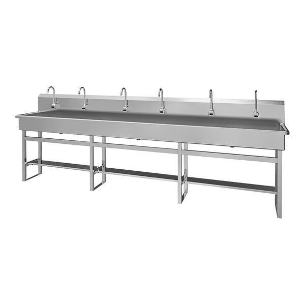 A stainless steel Sani-Lav floor-mounted utility sink with 6 sensor faucets.