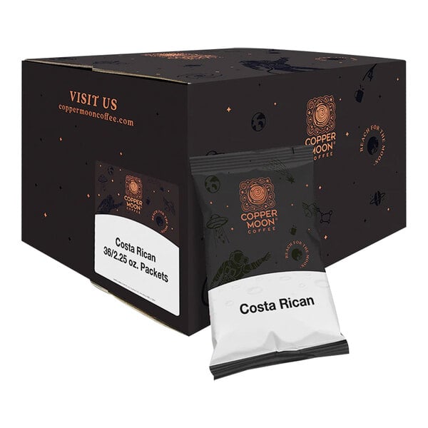 A black box with a white label containing Copper Moon Costa Rican Blend coffee packets.