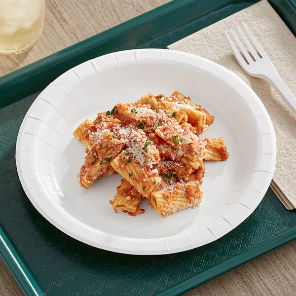 A Choice white heavy weight paper plate with a plastic fork and a plate of pasta with sauce and cheese on it.