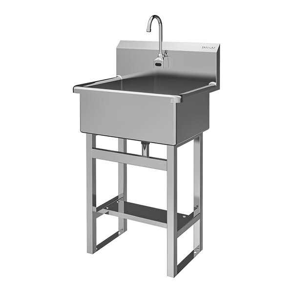 A large stainless steel floor-mounted scrub sink with a battery-powered faucet.