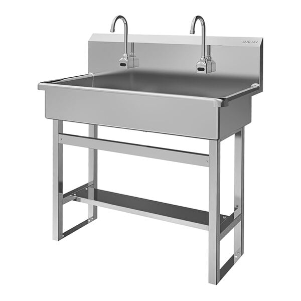 A stainless steel Sani-Lav floor-mounted multi-station utility sink with two faucets.