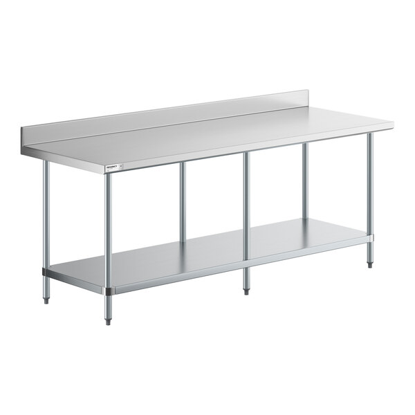 A stainless steel work table with a backsplash, four legs, and a lower undershelf.