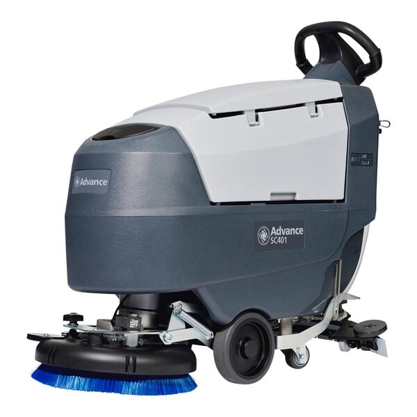 An Advance SC401 walk behind floor scrubber with a blue brush on the bottom and wheels.