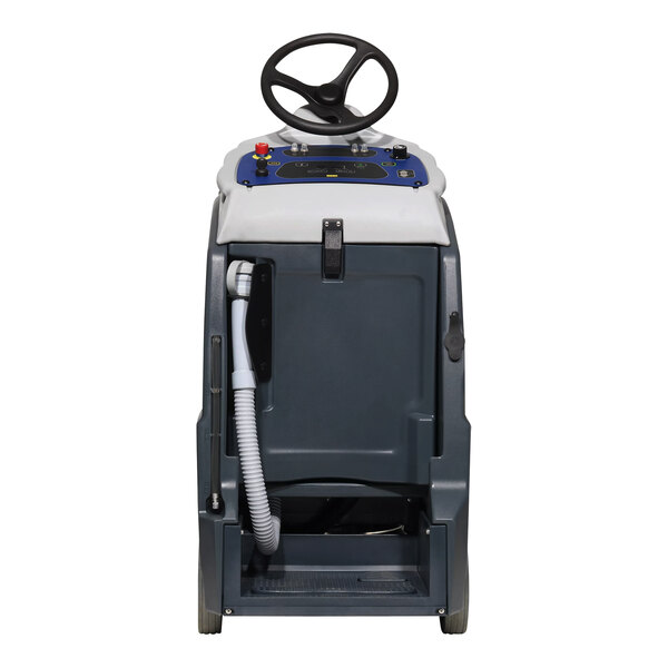 A close-up of the Advance SC1500 cordless stand-on floor scrubber with a steering wheel.