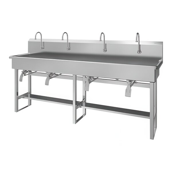A large stainless steel floor-mounted multi-station Sani-Lav utility sink with knee-operated faucets.