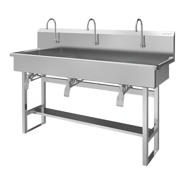 A stainless steel Sani-Lav multi-station floor-mounted utility sink with knee-operated faucets.