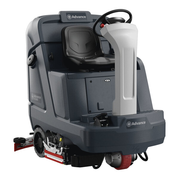 A black and yellow Advance SC5000 ride-on floor scrubber with a white seat.