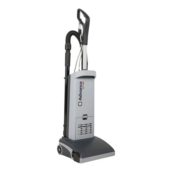 An Advance VU500 upright vacuum cleaner with a gray handle and black wheels.