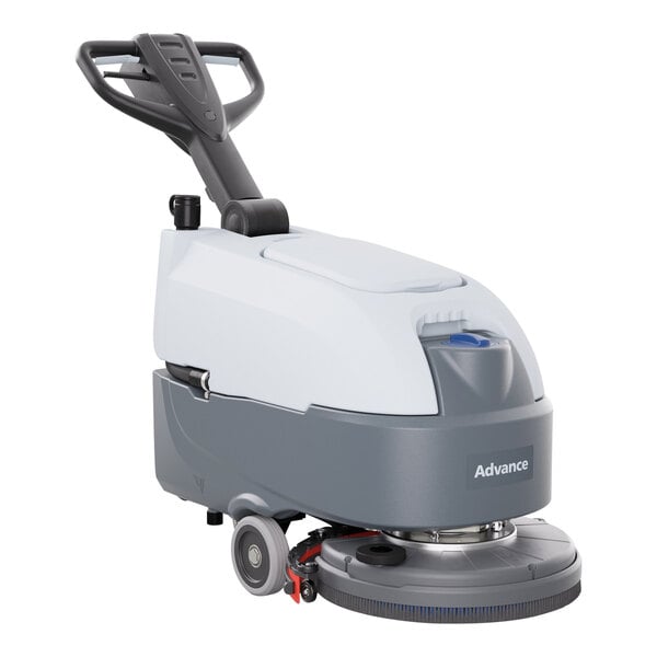 An Advance SC370 walk behind floor scrubber machine with wheels and a handle.