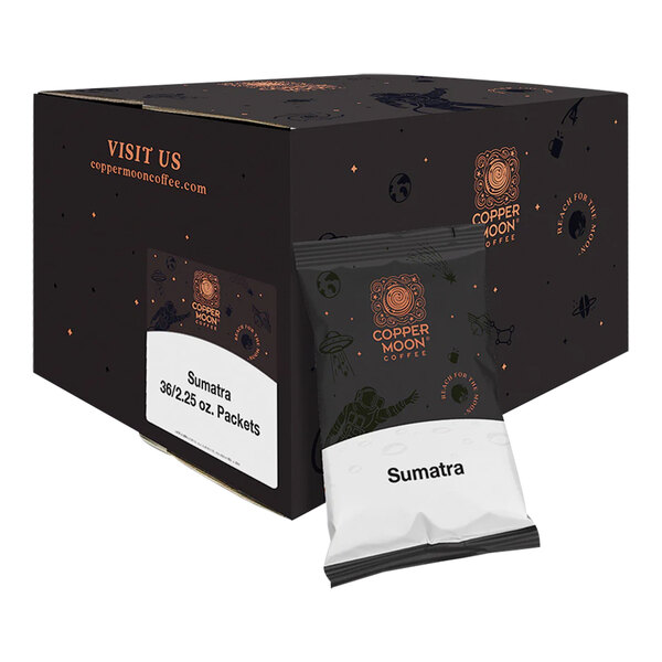 A black box of Copper Moon Sumatra Blend Coffee portion packs with white labels.