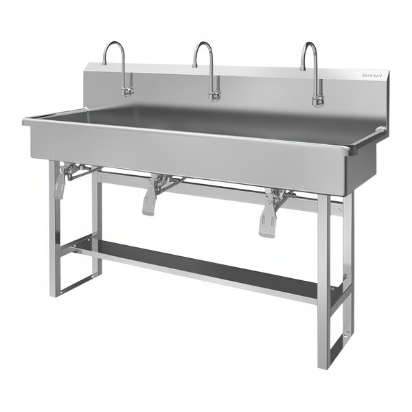 A stainless steel Sani-Lav floor-mounted utility sink with knee-operated faucets.