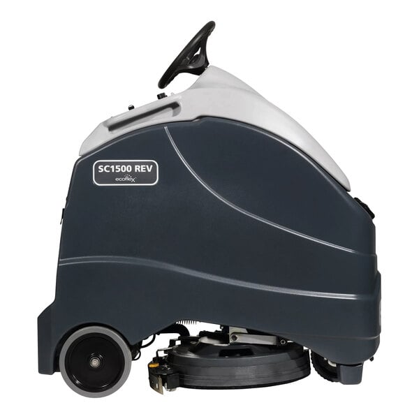 An Advance SC1500 EcoFlex stand-on floor scrubber with wheels.