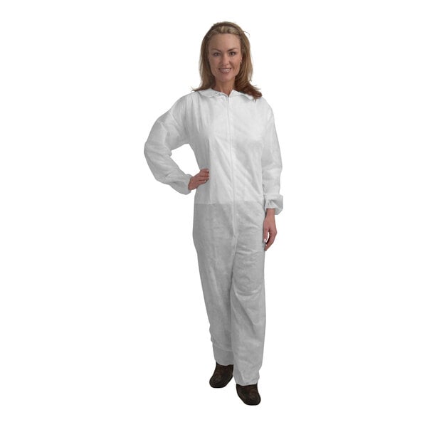 A woman wearing Cordova white coveralls.