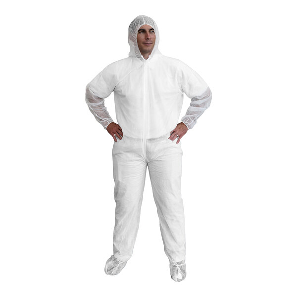 A man in Cordova white protective coveralls with a hood, wrists, and boots.