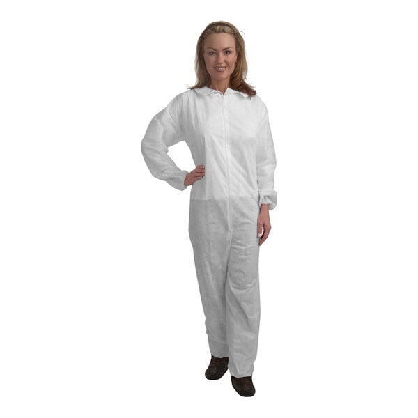 A woman wearing white Cordova coveralls.