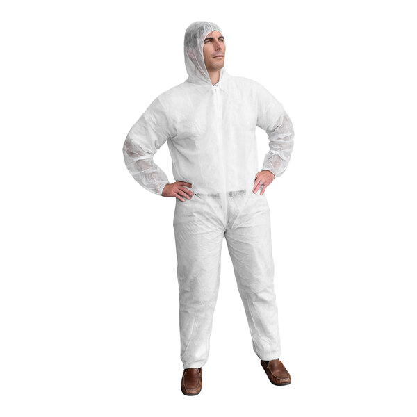 A man in a white protective suit with elastic wrists and a hood.