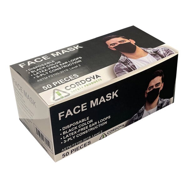 A box of Cordova black polypropylene face masks.