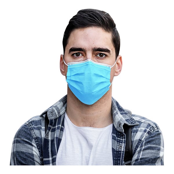 A man wearing a light blue Cordova general purpose face mask.