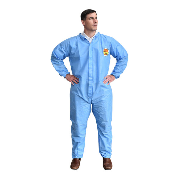 A man wearing blue Cordova polypropylene coveralls.