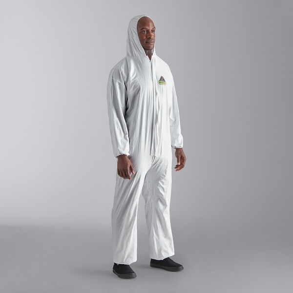 A man wearing a white Cordova Defender II coverall.