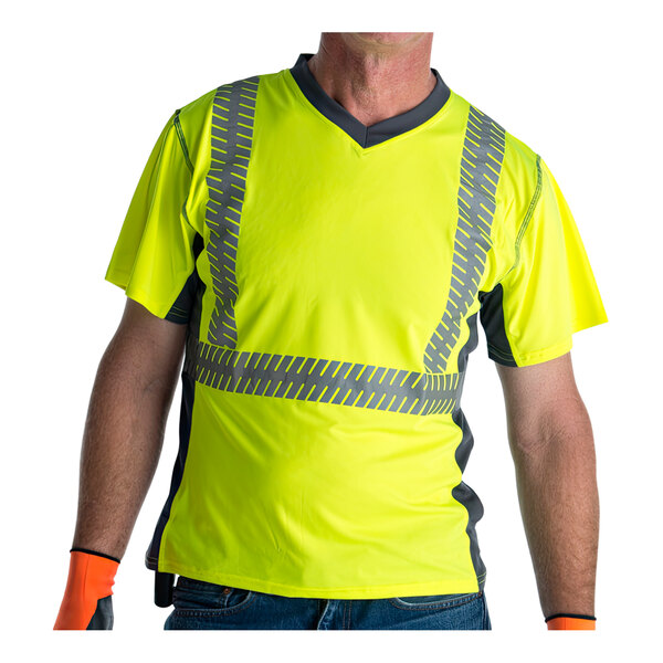 A man wearing a Cordova hi-vis yellow safety shirt with gray side panels and reflective tape.